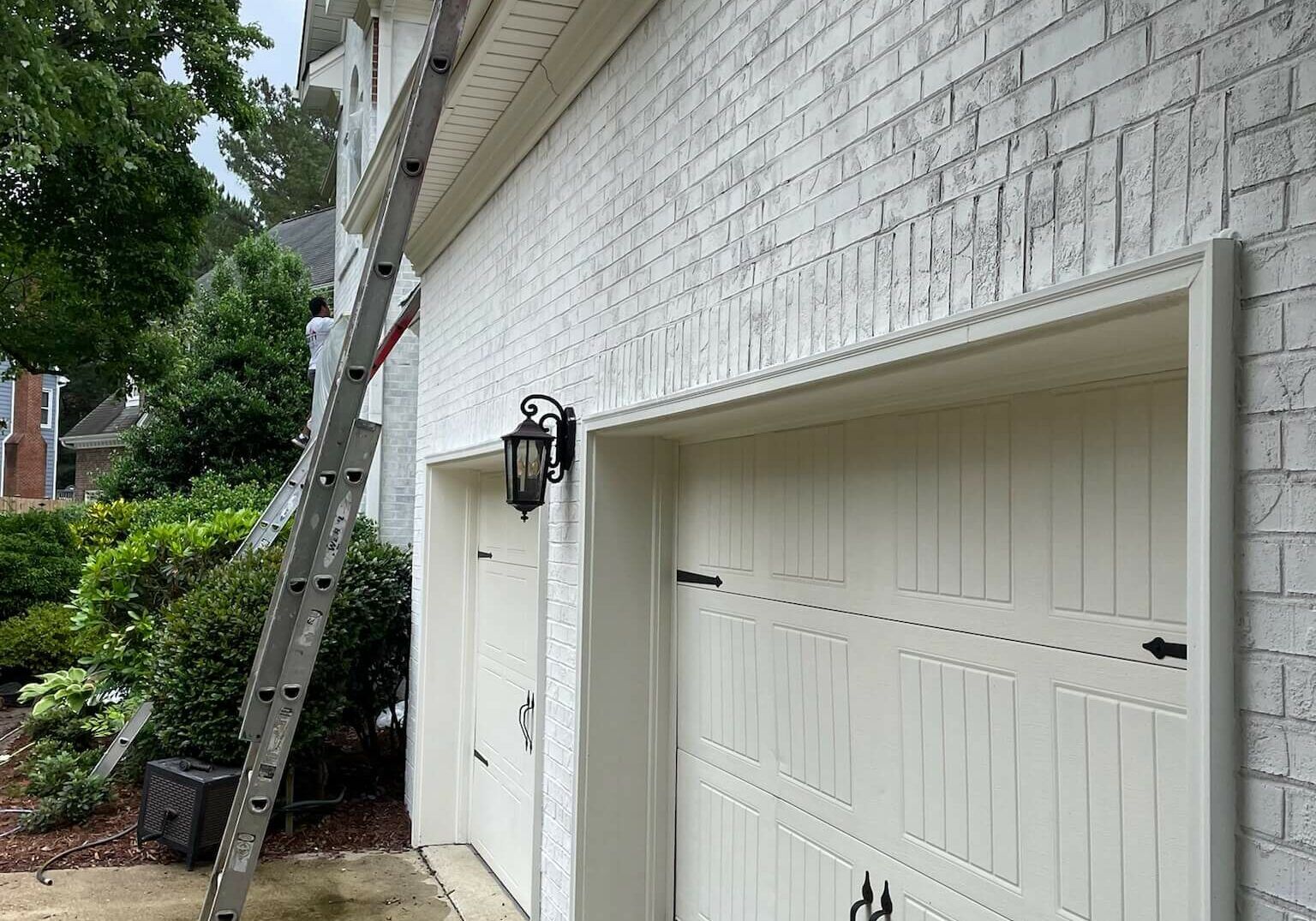 White-and-blue-shutter-painted-brick-cary-nc